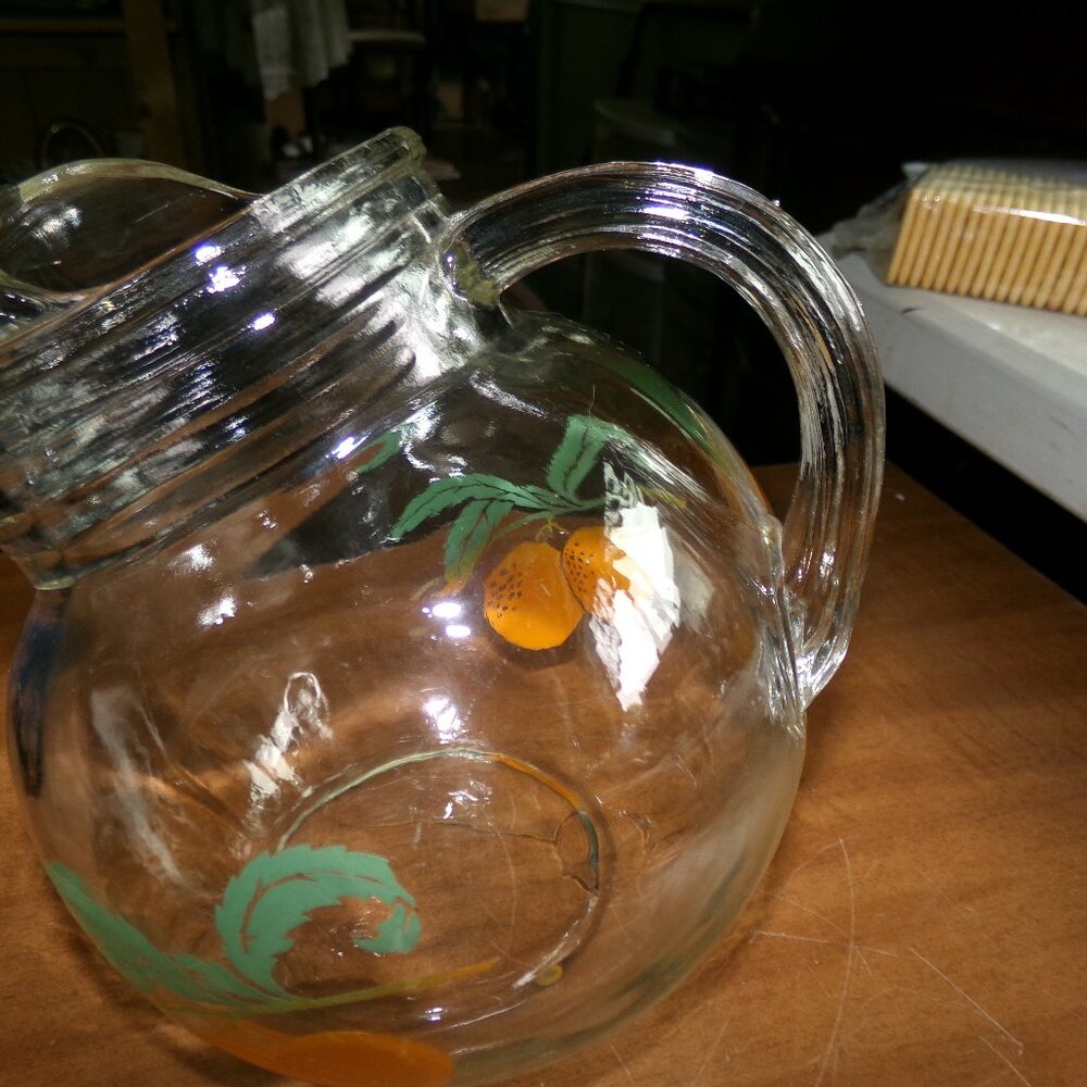 vintage glass orange juice pitcher.